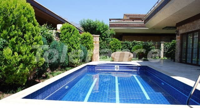 Magnificent luxury villa in the center of Kemer with a private plot of 500 m2 and a swimming pool - 9388 | Tolerance Homes