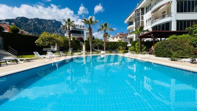 Apartment in Aslanbudcak, Kemer with pool - buy realty in Turkey - 124134