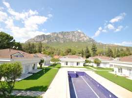 Apartment in Aslanbudcak, Kemer with pool - buy realty in Turkey - 104040