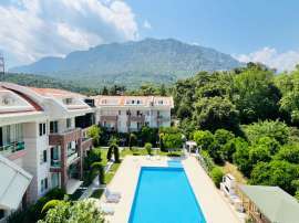 Appartement in Arslanbucak, Kemer zwembad - onroerend goed kopen in Turkije - 107043