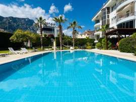 Apartment in Aslanbudcak, Kemer with pool - buy realty in Turkey - 124134