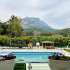 Apartment in Aslanbudcak, Kemer with pool - buy realty in Turkey - 124100