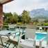 Apartment in Aslanbudcak, Kemer with pool - buy realty in Turkey - 124107