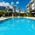 Apartment in Aslanbudcak, Kemer with pool - buy realty in Turkey - 124134