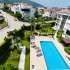 Apartment in Aslanbudcak, Kemer with pool - buy realty in Turkey - 107018