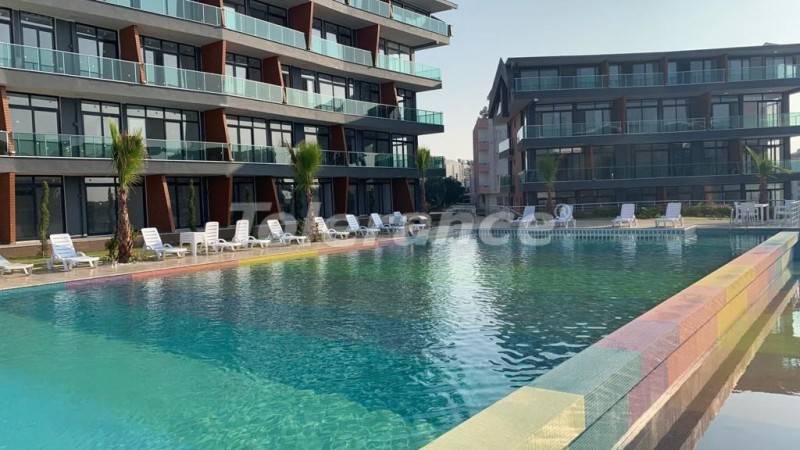 شقق من المتعهد في:في ديديم اطلالة على البحر مسبح - شراء عقار في تركيا - 24236