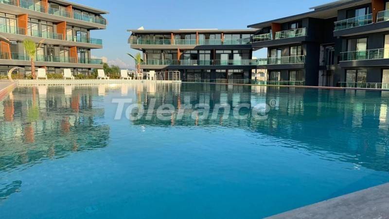 شقق من المتعهد في:في ديديم اطلالة على البحر مسبح - شراء عقار في تركيا - 24240