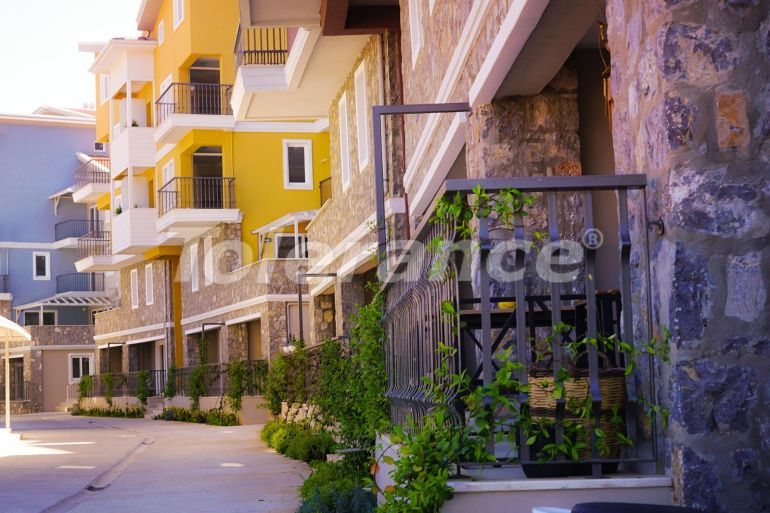 Appartement van de ontwikkelaar in Fethiye zwembad - onroerend goed kopen in Turkije - 79285