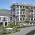 آپارتمان از سازنده که در کاراجیک, آلانیا منظره دریا استخر - خرید ملک در ترکیه - 28005