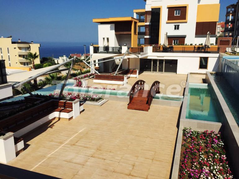 Appartement van de ontwikkelaar in Kuşadası zeezicht zwembad - onroerend goed kopen in Turkije - 98215