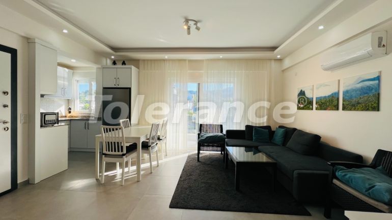 Appartement in Kuzdere, Kemer zwembad - onroerend goed kopen in Turkije - 135934