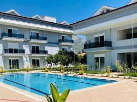 Appartement van de ontwikkelaar in Kuzdere, Kemer zwembad - onroerend goed kopen in Turkije - 43579