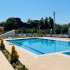 Appartement van de ontwikkelaar in Kuzdere, Kemer zwembad - onroerend goed kopen in Turkije - 43580