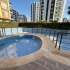 Appartement in Mezitli, Mersin zwembad - onroerend goed kopen in Turkije - 130140