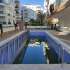Apartment еn Muratpaşa, Antalya piscine - acheter un bien immobilier en Turquie - 48232