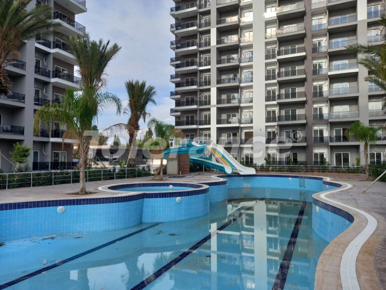 Appartement in Tece, Mersin zeezicht zwembad - onroerend goed kopen in Turkije - 112053