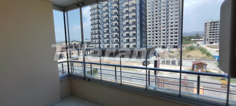 Appartement in Tece, Mersin zwembad - onroerend goed kopen in Turkije - 116850