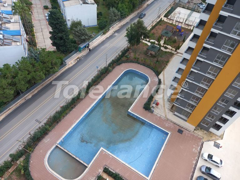 شقق في:في تيجي مرسين, مرسين اطلالة على البحر مسبح - شراء عقار في تركيا - 134353