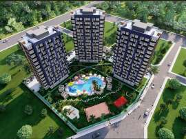 Apartment from the developer in Tece, Mersin, Mersin with pool with installment - buy realty in Turkey - 64484