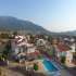 Villa from the developer in Çalış Beach, Fethiye with sea view with pool - buy realty in Turkey - 69769