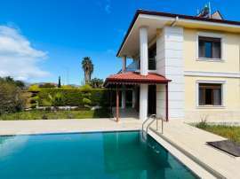 Villa еn Çamyuva, Kemer piscine - acheter un bien immobilier en Turquie - 104092