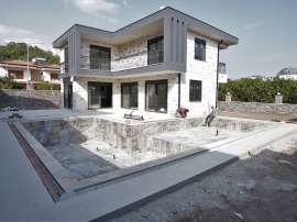 Villa from the developer in Çamyuva, Kemer pool - buy realty in Turkey - 46822