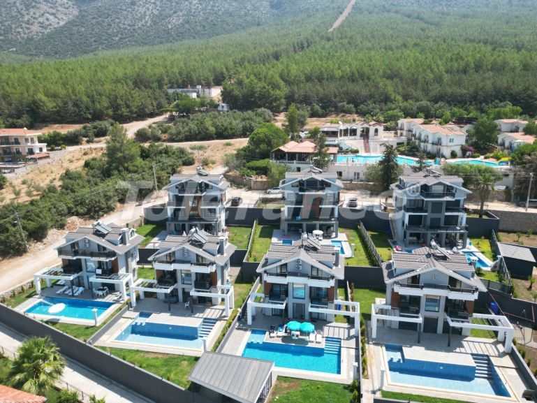 Вилла или дом в Оваджик, Фетхие вид на море с бассейном: купить недвижимость в Турции - 69970