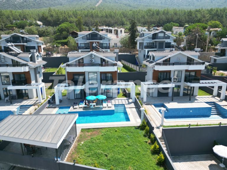 Вилла или дом в Оваджик, Фетхие вид на море с бассейном: купить недвижимость в Турции - 69986